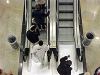 People on escalators